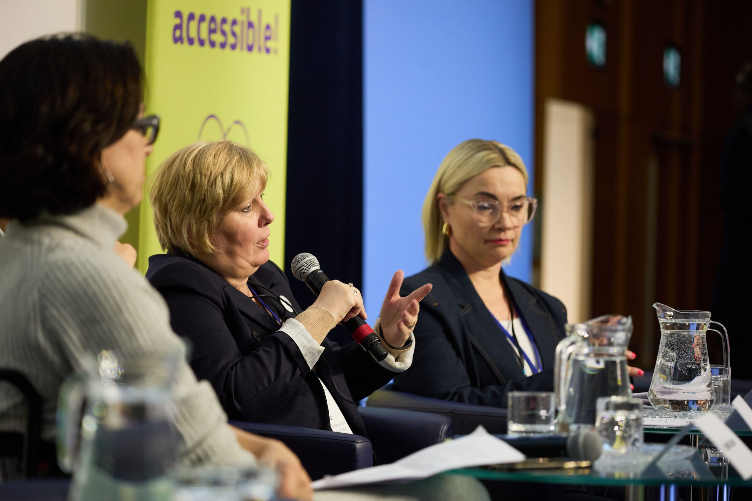 a photo of Lidia Best and other speakers at Zero Conference 2026, during a session